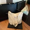 Bolsa Transfronteriza de Gran Capacidad para Mujer 2026 Nuevo Estilo Ligera de Alta Gama Bolso de Hombro Versátil Casual Bolso de Mano Bolsa Tote para Viaje