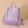 Primavera y Otoño nuevo tela de nylon color ligero simple personalidad mochila casual bolsa de mujer fábrica al por mayor comercio exterior