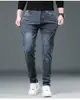 Jeans Masculino Grosso com Plus Veludo Slim de Perna Reta para Outono/Inverno 2026 Calças Longas Quentes Elásticas Jeans de Venda Quente