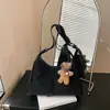 2026 Nova Bolsa de Ombro sob o Braço de Grande Capacidade para o Dia a Dia Bolsa de Ombro Simples Bolsa Tote de Nicho Bolsa Transversal Colorida Sólida da Moda Tendência