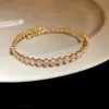 Pulseira de abertura redonda com zircônia europeia e americana, pulseira de luxo leve, sensação de alta qualidade, pulseira da moda, trabalho pesado, personalidade, joia de mão para mulheres, atacado