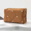 Bolsa de Cosméticos Acolchada con Lazo de Nuevo Estilo Transfronteriza, Neceser Portátil de Viaje, Bolsa de Almacenamiento para Labiales y Cosméticos para Niñas