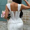 Estilo europeo y americano color liso diseño elegante encaje semitransparente ballena de pez encaje pequeño prenda de exterior cierre de corbata escote en V profundo camisola 71647