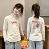 Nueva Camiseta Base de Manga Larga con Cuello Alto y Volantes para Niñas Otoño Invierno Polar Térmico Ropa Interior para Niños Pequeños y Medianos Top Cepillado