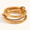 Anel de diamante multicor de camada dupla transfronteiriço Europa e Estados Unidos aço inoxidável banhado a ouro 18K temperamento design de nicho joia explosiva mulheres