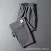 Pantalones de aire acondicionado exclusivos de seda helada transfronterizos, finos, talla grande para hombre, holgados, transpirables, de secado rápido, casuales, de pierna recta, estilo jogger, largos