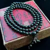 Venta al por mayor del fabricante Pulsera de rosario de ébano de 108 cuentas Moda para hombres y mujeres Pulsera versátil de múltiples vueltas de sándalo Venta al por mayor