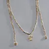 Collar con colgante de flor cuadrada de cuentas transfronterizo europeo y americano, cadena para la clavícula estilo coreano suave, joyería de diseño de nicho al por mayor