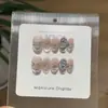 Um par de [Diamond Moonlight] Rosa Gradiente Explosão de Primavera Brilhante Design Olho de Gato Estrela de Strass Zircônia Unhas Usáveis