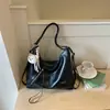 Bolsa casual nicho estilo coreano, nova bolsa tote de moda verão 2026, alta aparência, bolsa de ombro de grande capacidade para o dia a dia