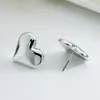 Pendientes de estrella de la moda coreana para mujer diseño de alta gama sentido del diseño pendientes con forma de corazón lujo ligero temperamento pendientes geométricos clip para la oreja venta al por mayor