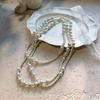 Estilo Francês Elegante Colar de Pérolas Shi para Mulheres Estilo Hepburn Luxo Leve Camadas Empilhadas Alto Padrão Usável Usável Usável Corrente Colar