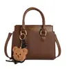 Bolsa Elegante Versátil para Mulheres 2026 Novo Modelo Monograma Moda Simples Casual Bolsa de Mão Bolsa Tote de Ombro Bolsa Transversal