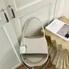 Bolsa de Axila com Textura Trançada Feminina 2026 Nova Bolsa Versátil Sensação Casual Bolsa de Ombro Único Bolsa de Axila Bolsa de Mão