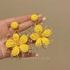 ¡Estilo de Vacaciones en la Playa! Aretes de Flor Trenzada Francesa para Mujer, Aretes Nuevos de Nicho y Únicos 2025, Aretes Adelgazantes para el Rostro
