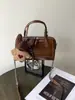 Bolso Cilíndrico Boston de Gama Alta, Bolso Redondo Pequeño con Cadena de Moda de Nicho, Elegante Bolso Almohada, Bolso Versátil de Hombro Cruzado