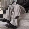 Pantalones casuales de estilo americano con forro polar para hombre de High Street, pantalones de combate impermeables, marca de moda Ruoshuai, pantalones rectos sueltos.