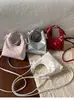 Bolso pequeño de moda estilo coreano 2026 verano nuevo bolso de mano dulce chica corazón forma de alta calidad moda hombro bandolera
