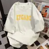 Verão 2025 Novo Estilo Estampa de Letras Manga Curta Camiseta Oversize Casual Solta Roupa de Trabalho Top Tendência