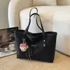 Bolsa Tote Grande de Capacidad Retro 2026 Nueva Casual para Viajar al Trabajo de un Solo Hombro Versátil Bolso de Axila Bolso de Mano Bolsas Transfronterizas
