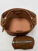 Bolso tipo cubo retro simple Shuai Mi Jia para mujer, nuevo bolso de moda para el hombro o cruzado de principios de otoño de 2026, bolso casual para el día a día