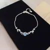 Conjunto de collar, pulsera y pendientes de lazo hueco de circón exquisito estilo coreano, accesorios de nicho de lujo ligero de alta gama, versátil