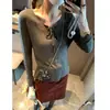 Moque Nova Coleção de Outono: Blusa de Tricô Texturizada Plissada com Amarração Frontal Decote V Caimento Solto Emagrecedora MQ1832
