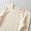 Ropa de Mujer al por Mayor Transfronteriza Estilo Europeo y Americano Chica Popular Cuello Redondo Adelgazante Mangas Largas Tops Versátil Temperamento Camisetas Sexy