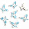 Colgante de mariposa de aleación simple con incrustación de perlas de aceite, colgante para collar DIY, pulsera, accesorios de joyería al por mayor