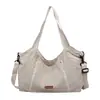 Nova Bolsa de Lona Outono 2026 Estilo Coreano Retrô Cor Sólida Grande Capacidade Bolsa Tote para Trabalho Deslocamento Bolsa de Ombro Casual