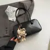Bolso de mano retro para mujer 2026 nuevo de alta gama para el hombro gran capacidad tipo tote para el día a día bolso de hombro casual moderno
