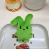 Lindo peluche de dibujos animados conejo de orejas rojas muñeco colgante broche bolsa zapato accesorio de ropa accesorio de juguete de peluche de conejo