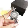 Reloj de cristal de nicho, reloj analógico simple, reloj para mujer con correa hueca incrustada de diamantes, reloj listo en stock