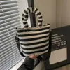 Bolso de Mano de Muñeca Mickey de Moda Transfronterizo Estilo Nuevo para Niñas Rayas Color Bloqueo Moda Versátil Bolso de Hombro Cruzado para Viajes
