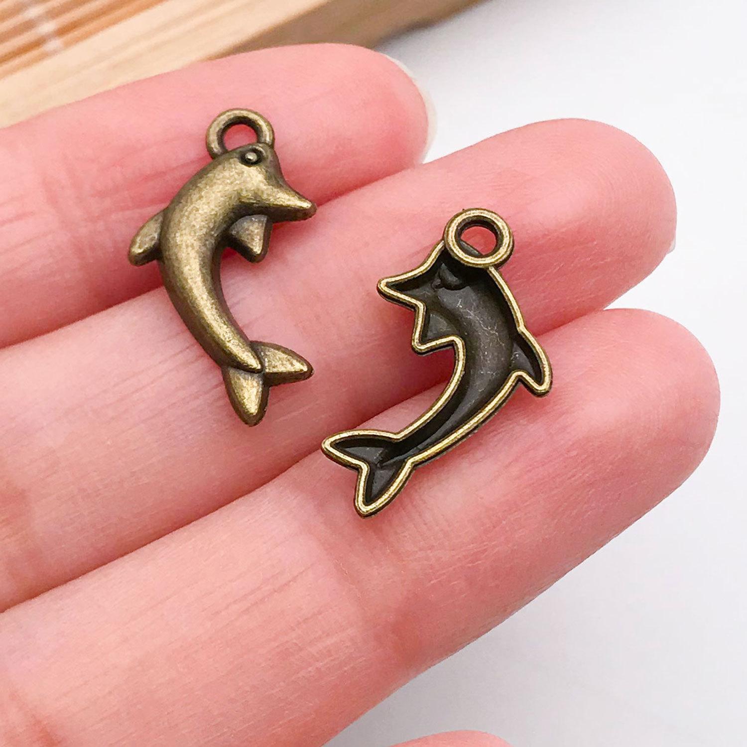 20725-M-古青锌合金海洋海豚20x11mm-0.5g.