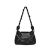Bolsas populares de nicho de varios años para mujer otoño 2026 nuevo estilo bolso cruzado texturizado bolso de mano bolso de hombro único para debajo del brazo