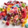 Según la liquidación de artículos de cola de gato, cabeza de flor artificial de flor falsa, accesorios de ropa DIY, decoración de sombrero de paja, accesorios para fotos de boda