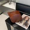 2025 nova bolsa de couro curtido vegetal de alta qualidade bolsa de couro de vaca bolsa balde tote preguiçosa retrô couro feminina uma geração de cabelo