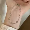 Pulsera de Lujo Accesible con Diamantes Redondos Pequeños Estilo Coreano para Mujer Zirconia Elegante Gama Alta Exquisito Ins Versátil Diseño de Nicho Nueva Joyería para la Mano