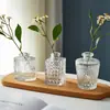 Comercio Exterior Lujo Ligero Retro Jarrón Pequeño Vidrio Repujado Mini Jarrón Transfronterizo Estilo Ins Arreglo Floral Hidropónico Transparente para Sala de Estar