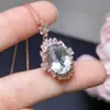 Colgante ovalado de cristal verde natural corte milenio al por mayor de fábrica, incrustación de plata 925, popular colgante grande para mujer con gema roja pequeña