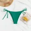 Nuevos Sexy 2026 Triángulo Aguas Termales Color Sólido Estilo Europeo y Americano Bañador para Hombre Venta al por Mayor Transfronterizo Atado Traje de Baño de Playa Bikini para Mujer
