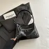 Nueva bolsa de cuero encerado para motocicleta de comercio exterior transfronterizo 2026, bolsa de axila de gran capacidad, bolso de hombro retro moderno, bolso tipo empanada