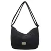 Bolso acolchado de color liso estilo coreano para mujer 2026 Otoño/Invierno Nuevo Tejido de nailon Gran capacidad Ligero para ir al trabajo Bolso de hombro único Cruzado para mujer