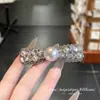 Pinza de Pelo de Lujo con Lazo de Perlas y Diamantes Completos para Recoger el Cabello de la Frente, Clip de Nuevo Estilo de Gama Alta Estilo Coreano Primavera/Verano 2026