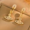 Pendientes de microdiamantes con diseño de Saturno y planeta, ligeros, de lujo, sencillos, para banquetes, superllamativos, de moda, elegantes y personalizados.