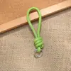 Bolsa de Corda de Couro PU Colorida Pingente Estilo Miu Simples Versátil Charme de Bolsa Chaveiro Acessório Lanyard de Celular Estilo Curto Novo