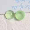 Versión coreana de gelatina transparente redonda de resina media pastilla parche pendientes DIY tocado para mujer funda de teléfono móvil material accesorios material
