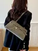 Coleção nova de 2026: bolsa pingente em formato de estrela, uma bolsa de mão elegante e sofisticada para mulheres, uma bolsa de ombro versátil e uma bolsa prática para o dia a dia