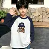 Camiseta de manga longa de algodão puro com blocos de cor estilosos para meninos, estilo coreano, casual e versátil, com mangas raglã, adequada para meninos de meia-idade e mais velhos